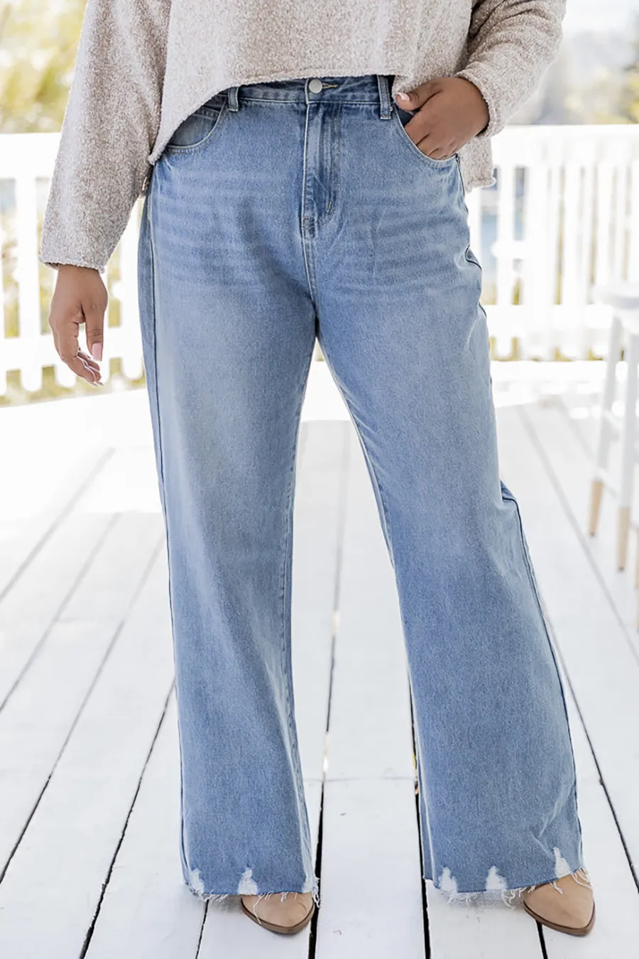 High Rise Light Wash Raw Hem Flare Jeans