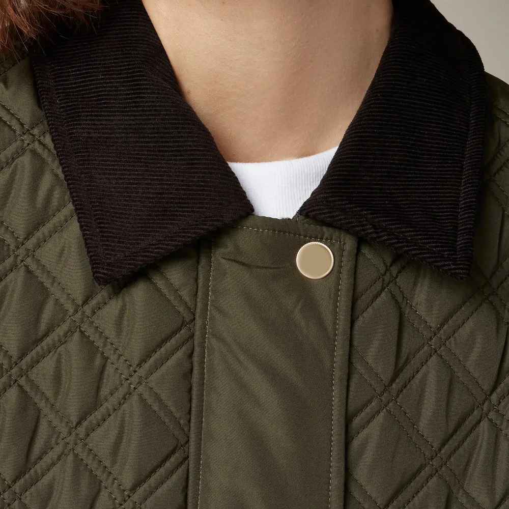 Corduroy-trim Quilted Vest In Green