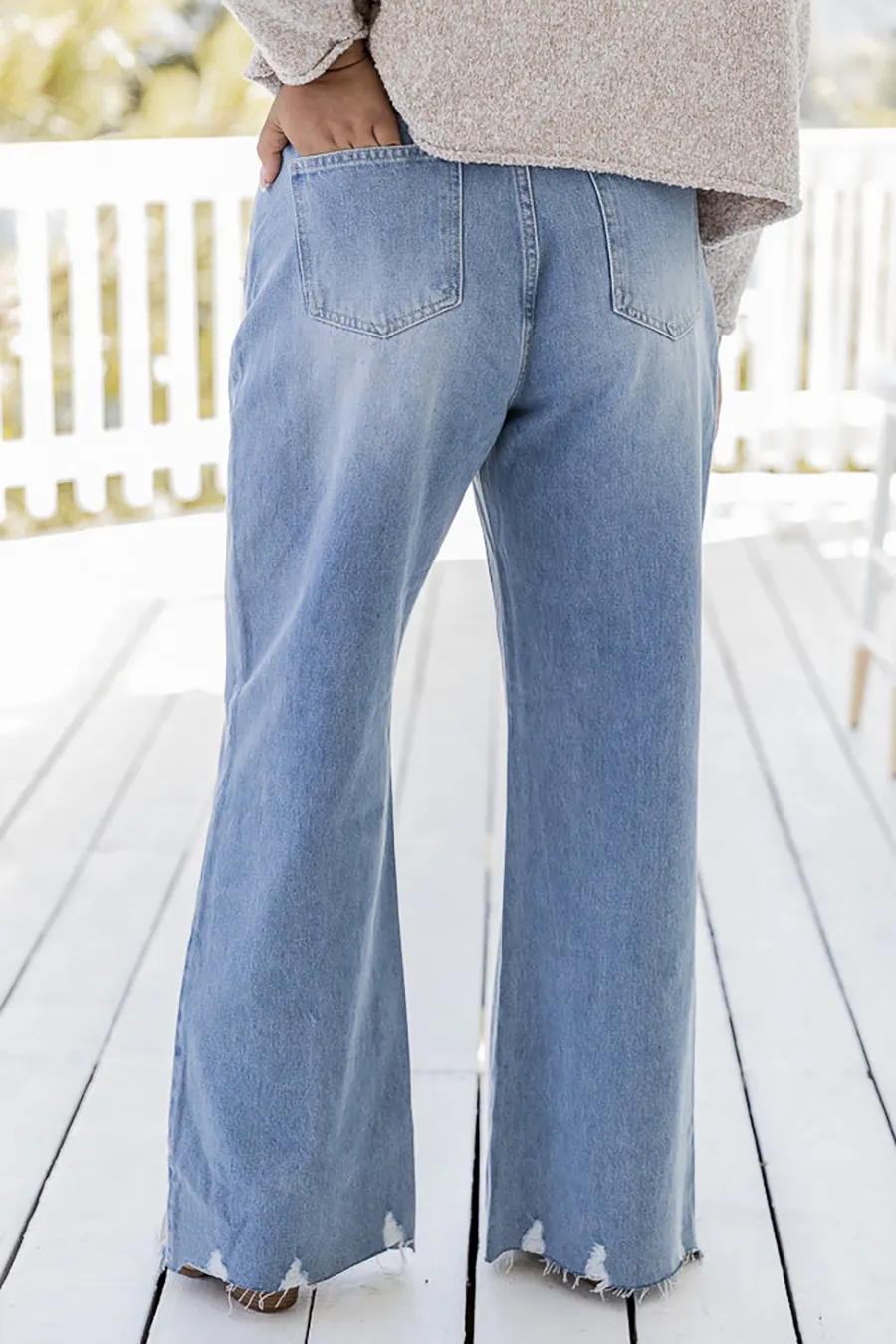 High Rise Light Wash Raw Hem Flare Jeans
