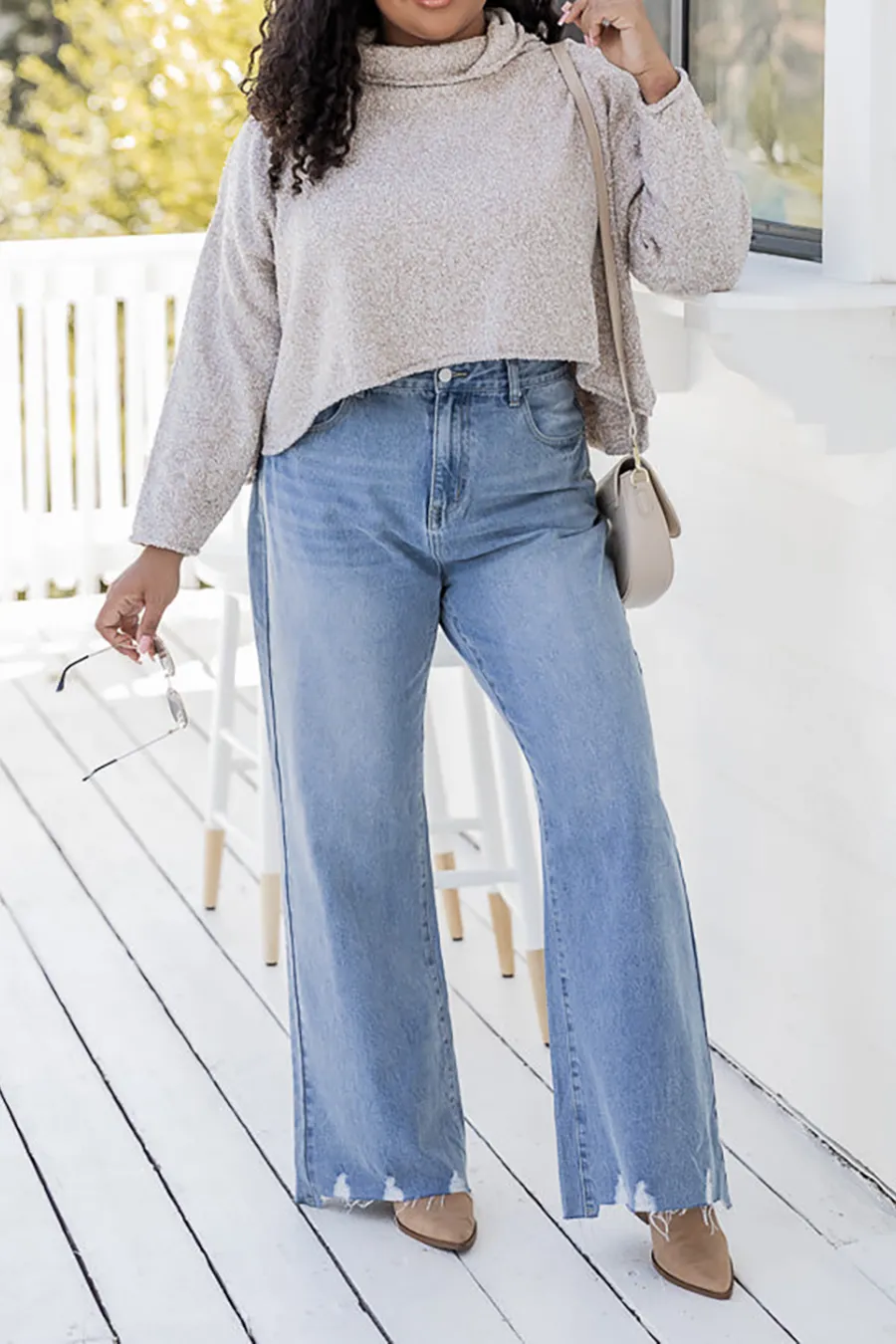 High Rise Light Wash Raw Hem Flare Jeans