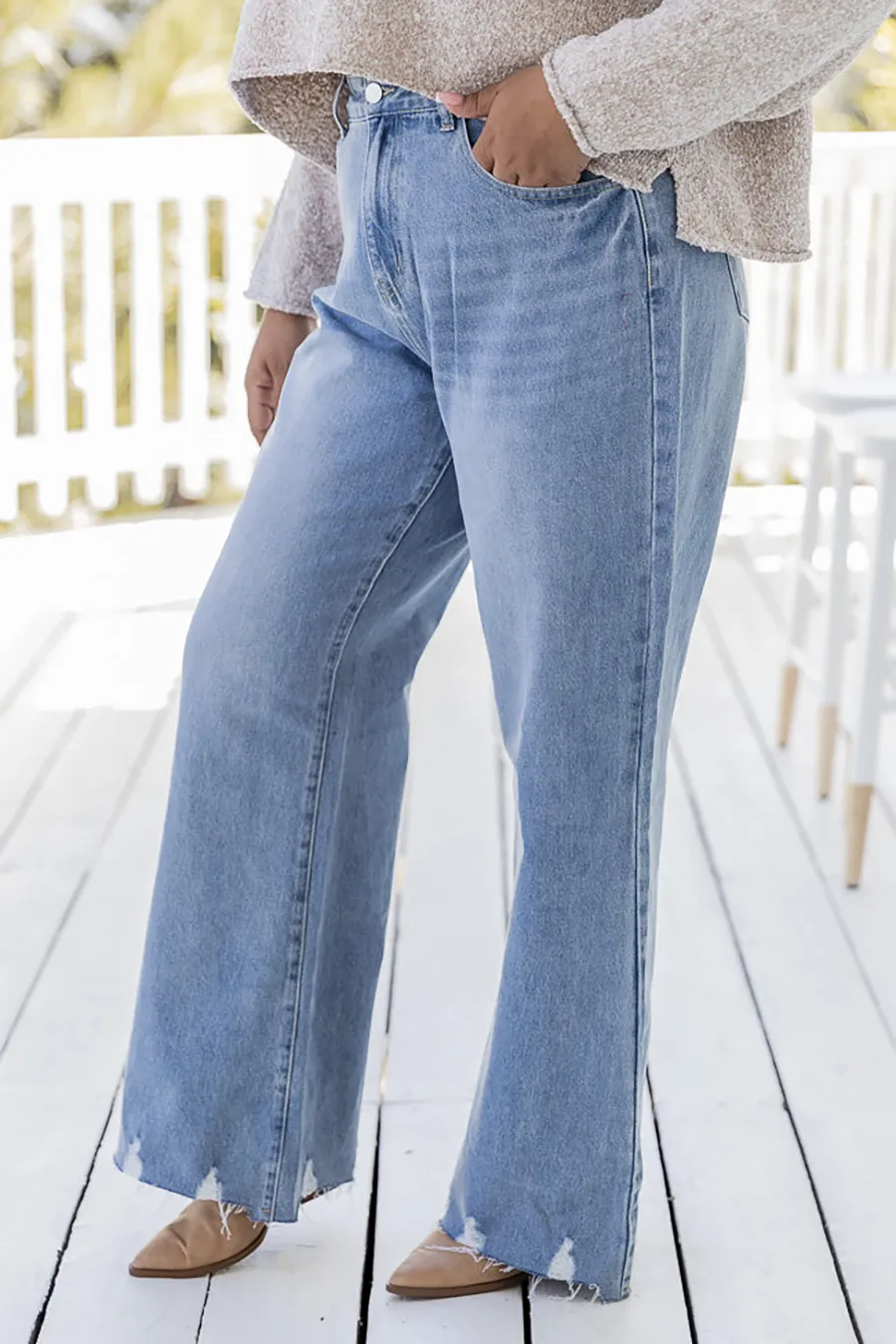 High Rise Light Wash Raw Hem Flare Jeans