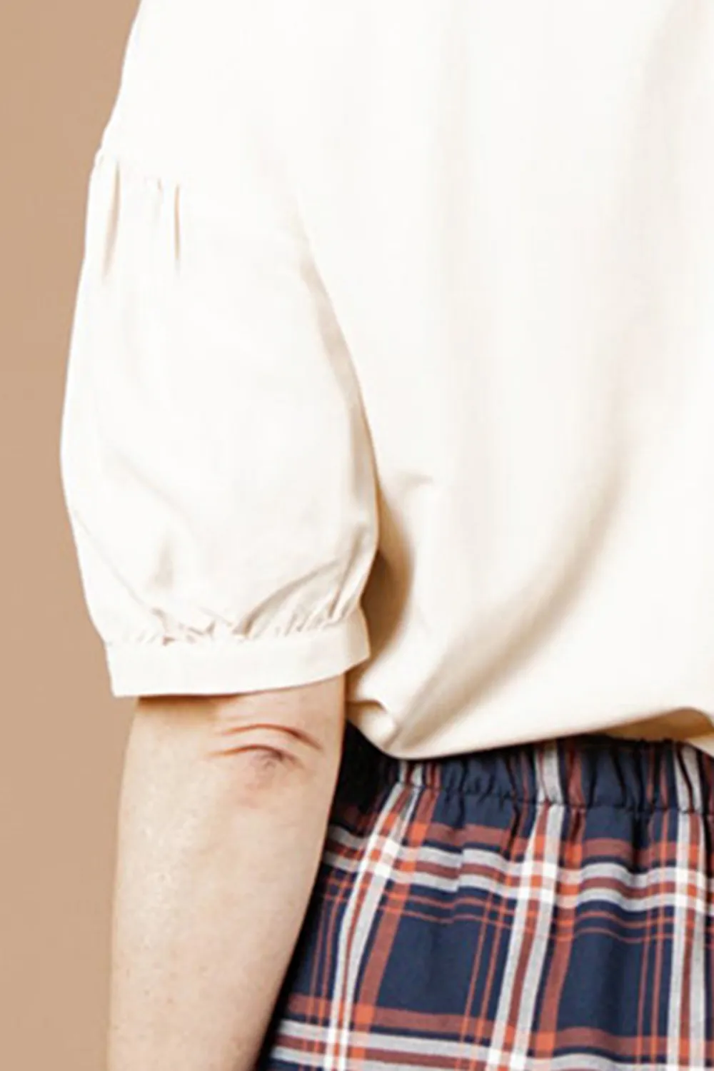 The V-neck Button Front Shirt